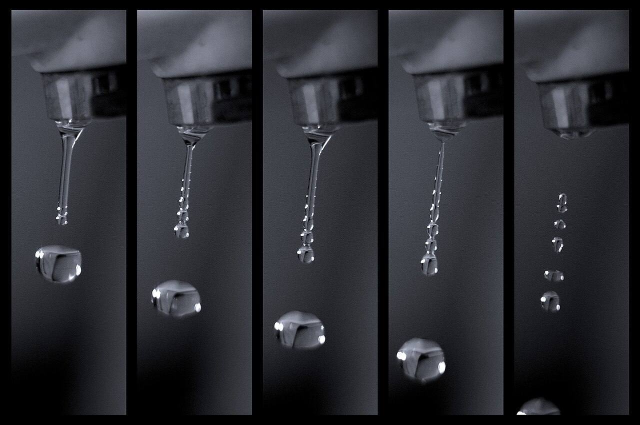 500px provided description: Freezing time in style. [#frozen ,#water ,#macro ,#time ,#kitchen ,#drop ,#drip ,#flowing ,#freeze ,#droplets ,#sink ,#high speed ,#